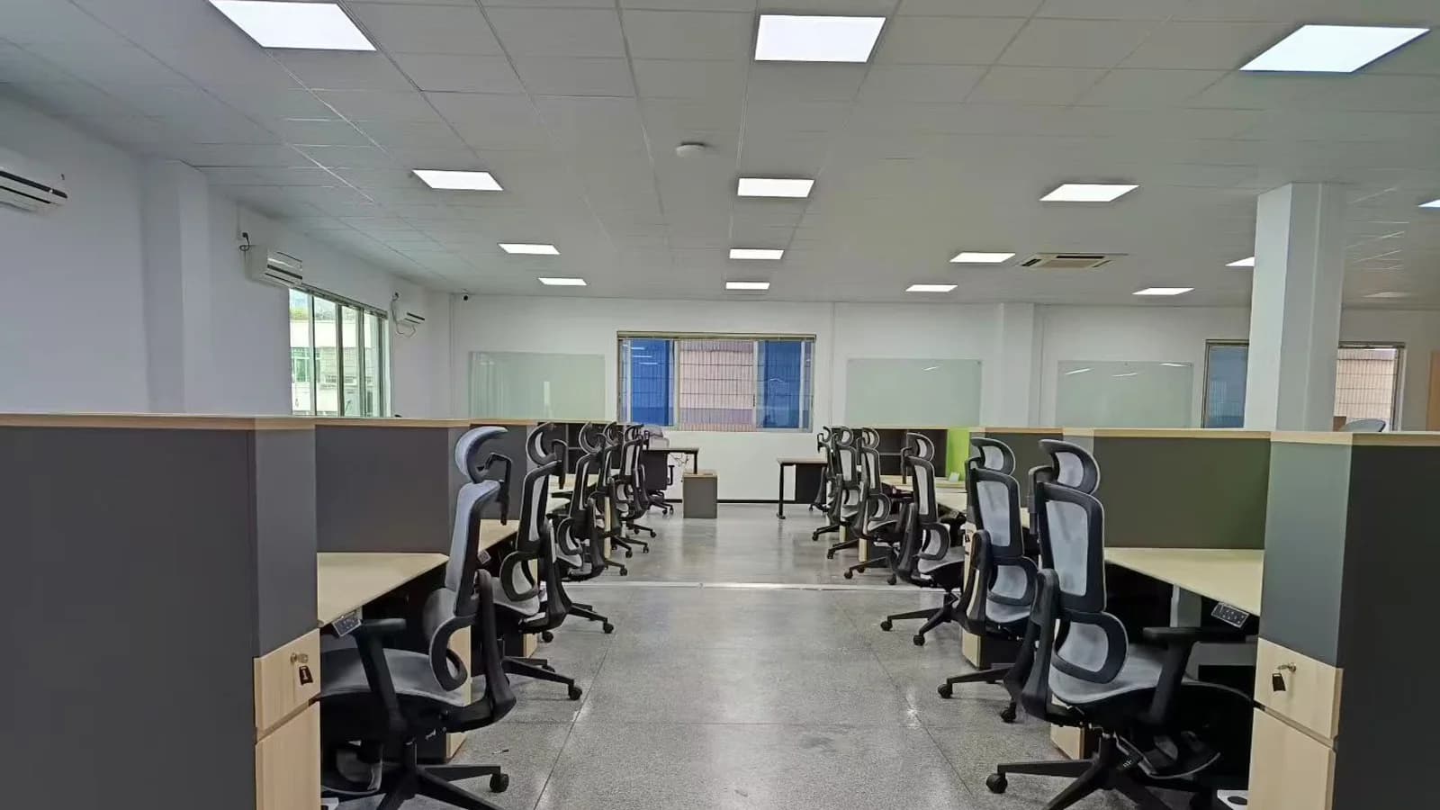 MENBRO high-back ergonomic office chairs arranged across a completed workstation