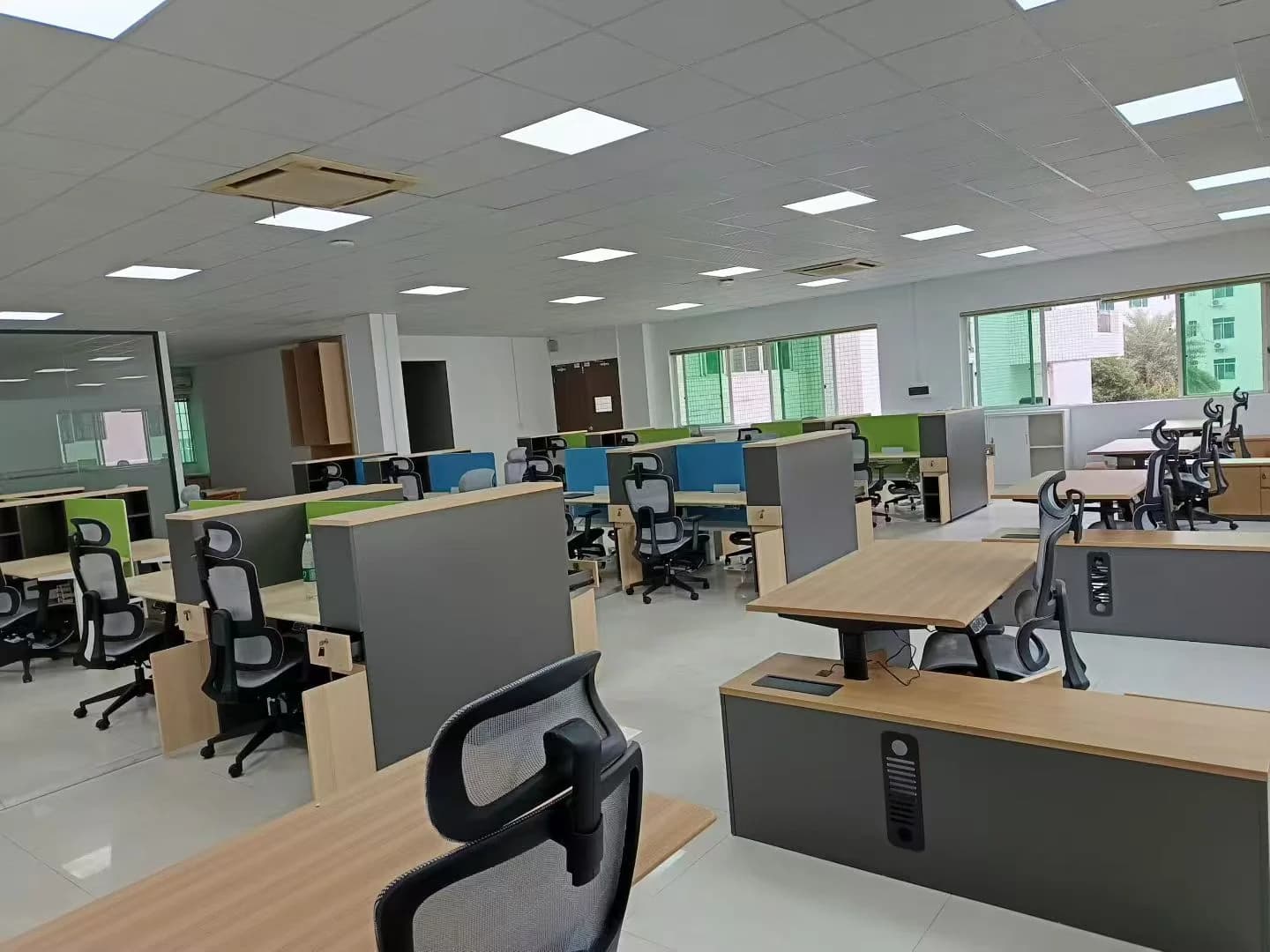 MENBRO ergonomic office chairs installed across a completed commercial workstation